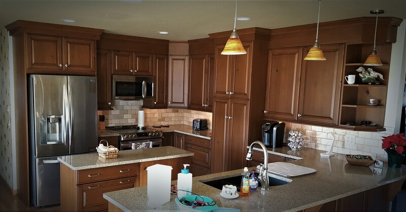 HEIRLOOM FINISH ON KNOTTY CHERRY CABINETS. TRIMMED TO CEILING.
