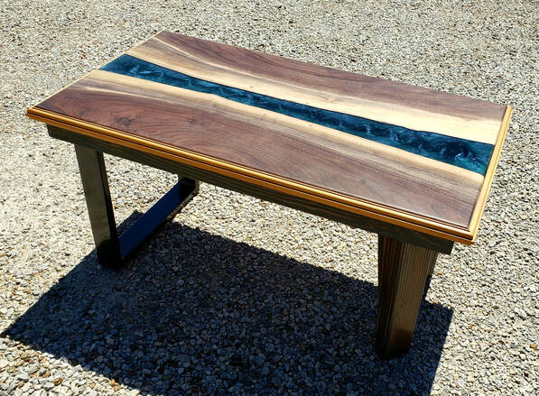 WALNUT AND EPOXY RIVER TABLE